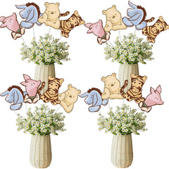 32 SPIRITS Winnie centerpieces brighten baby shower tables.