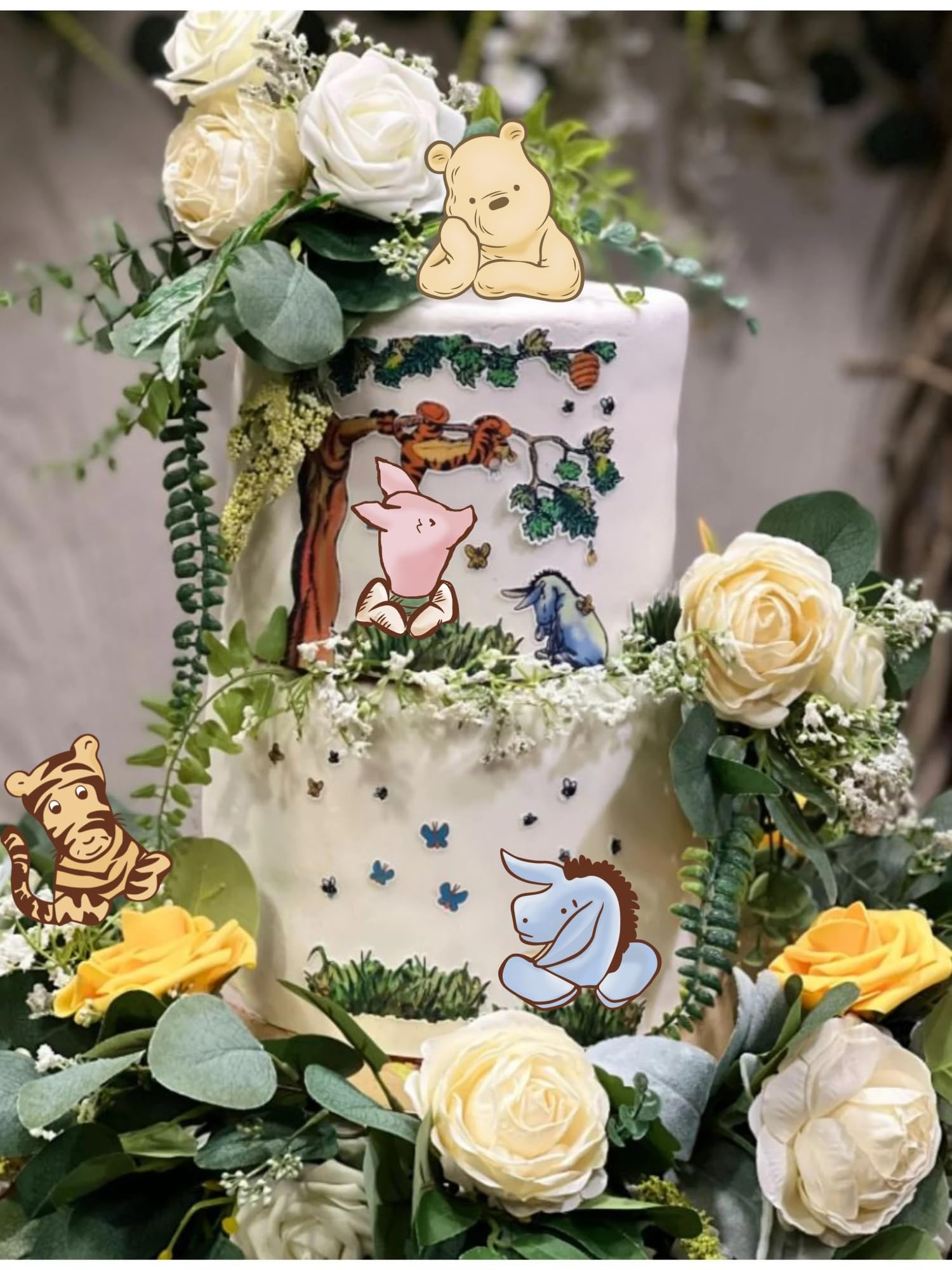 32 SPIRITS Winnie centerpieces include white sticks for clean toppers.