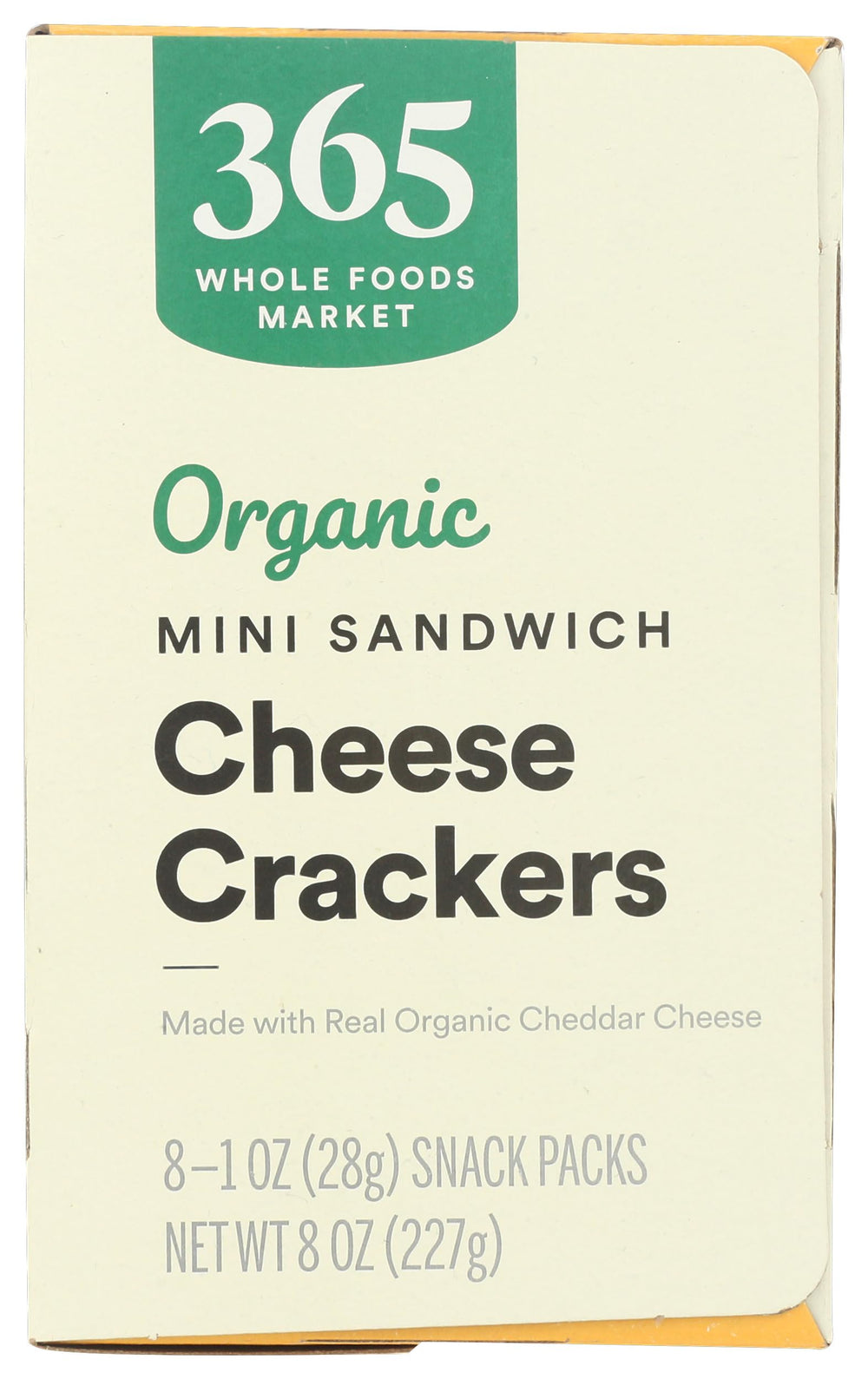 365 by Whole Foods Market organic cheddar filling in crunchy crackers.