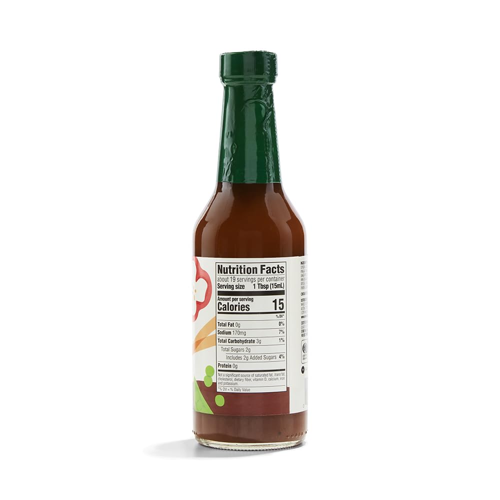 Pouring 365 stir-fry sauce for a quick, flavorful veggie and protein stir-fry