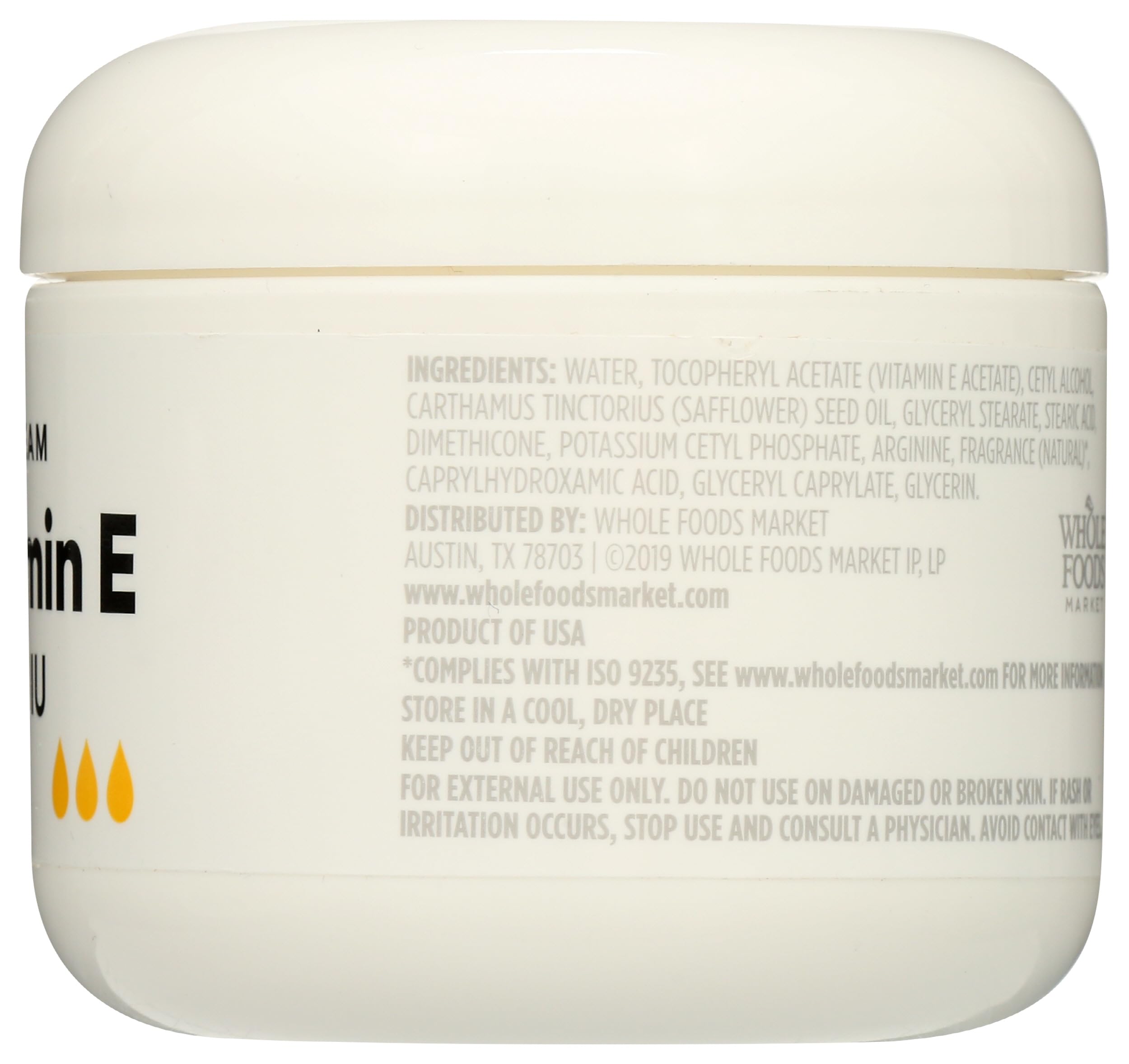 Ingredient list and clean beauty seal on 365 Vitamin E Cream packaging.