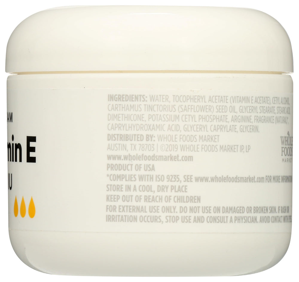 Ingredient list and clean beauty seal on 365 Vitamin E Cream packaging.