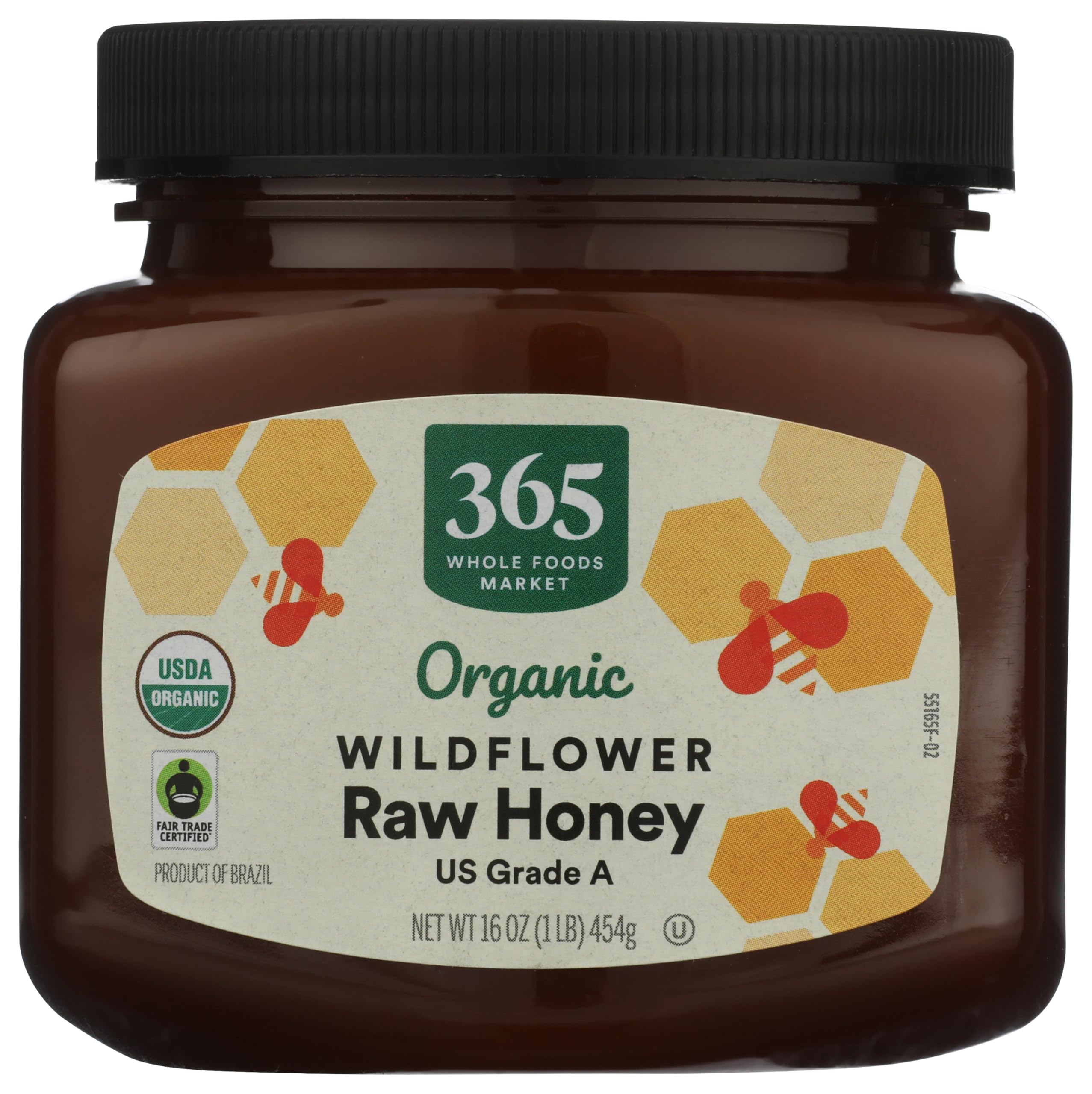 365 by Whole Foods Market organic raw wildflower honey bottle highlights natural amber color for flavorful cooking