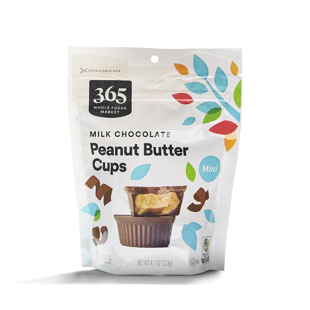 365 by Whole Foods Market mini cups unwrapped, creamy peanut butter center for a satisfying bite.