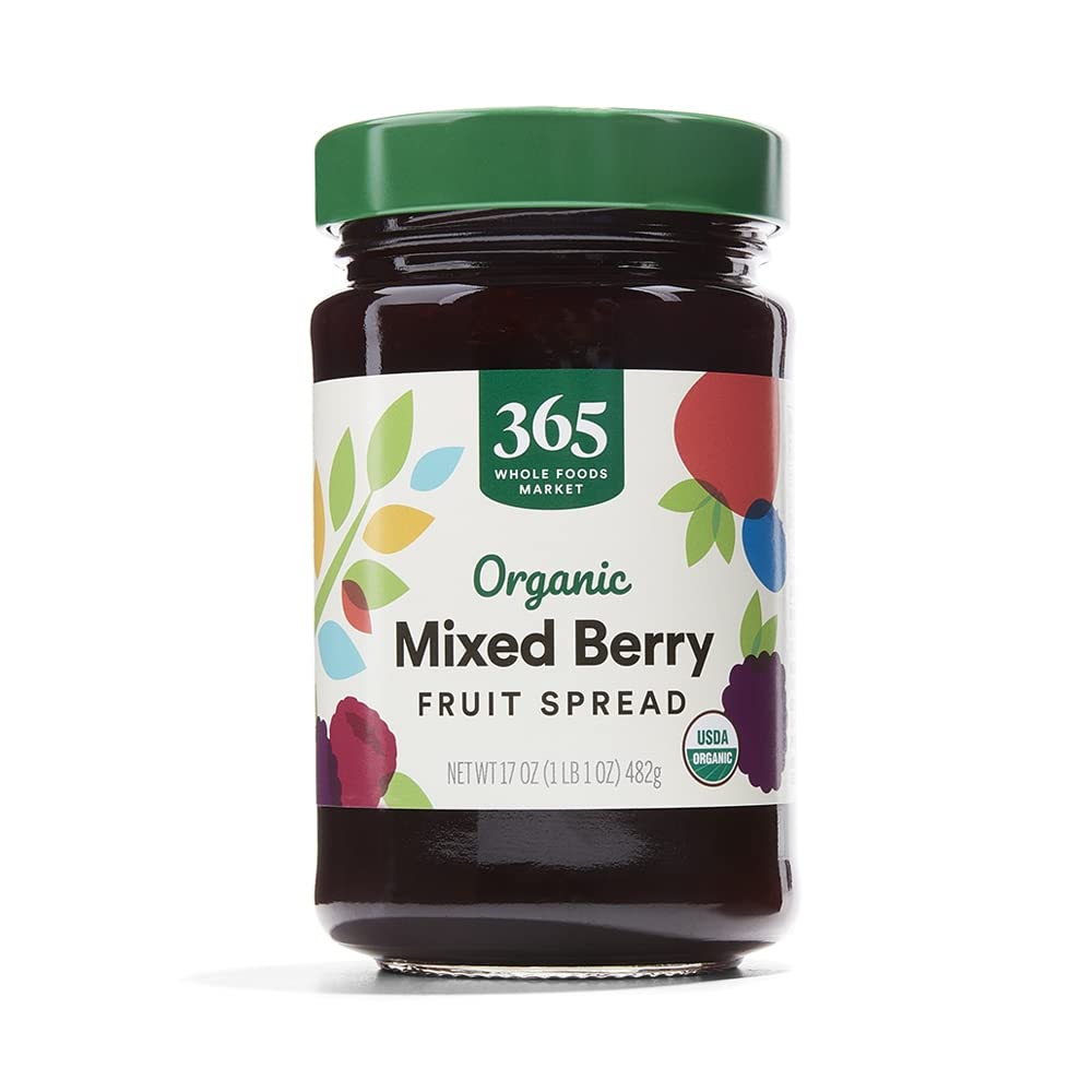 365 Organic Mixed Berry Fruit Spread jar on countertop, ideal pantry staple.