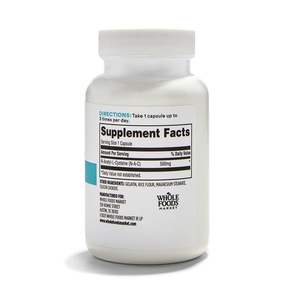 365 by Whole Foods NAC capsules closeup highlights 500mg dosage for daily use.