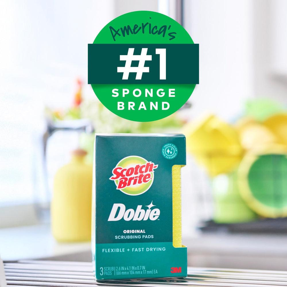 Close-up of absorbent 3M Scotch-Brite Dobie pads highlighting non-scratch action.