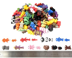 Mini animal figurines on a desk ready to brighten your workspace