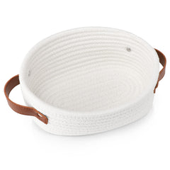 ABenkle small woven basket in oval white, ideal for compact storage.