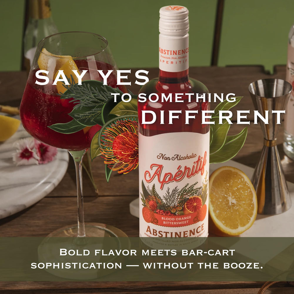 Abstinence Blood Orange Aperitif bottle with orange slice and mint garnish