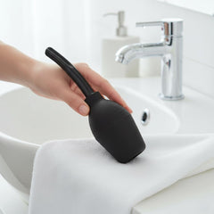 Abyclean anal douche bulb with detachable nozzle enables precise, comfortable application.