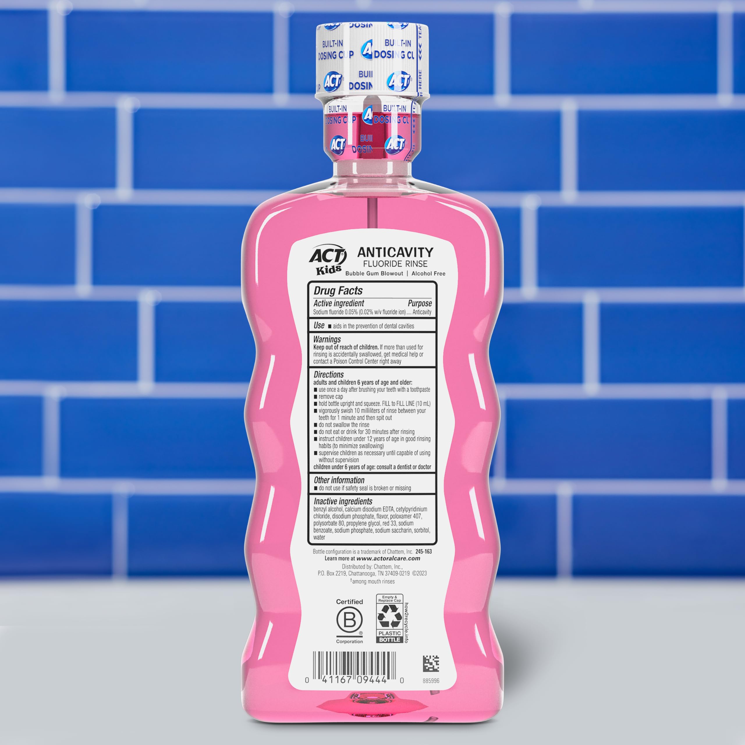 Dosing cup close-up for ACT Kids Anticavity Mouthwash precise use.