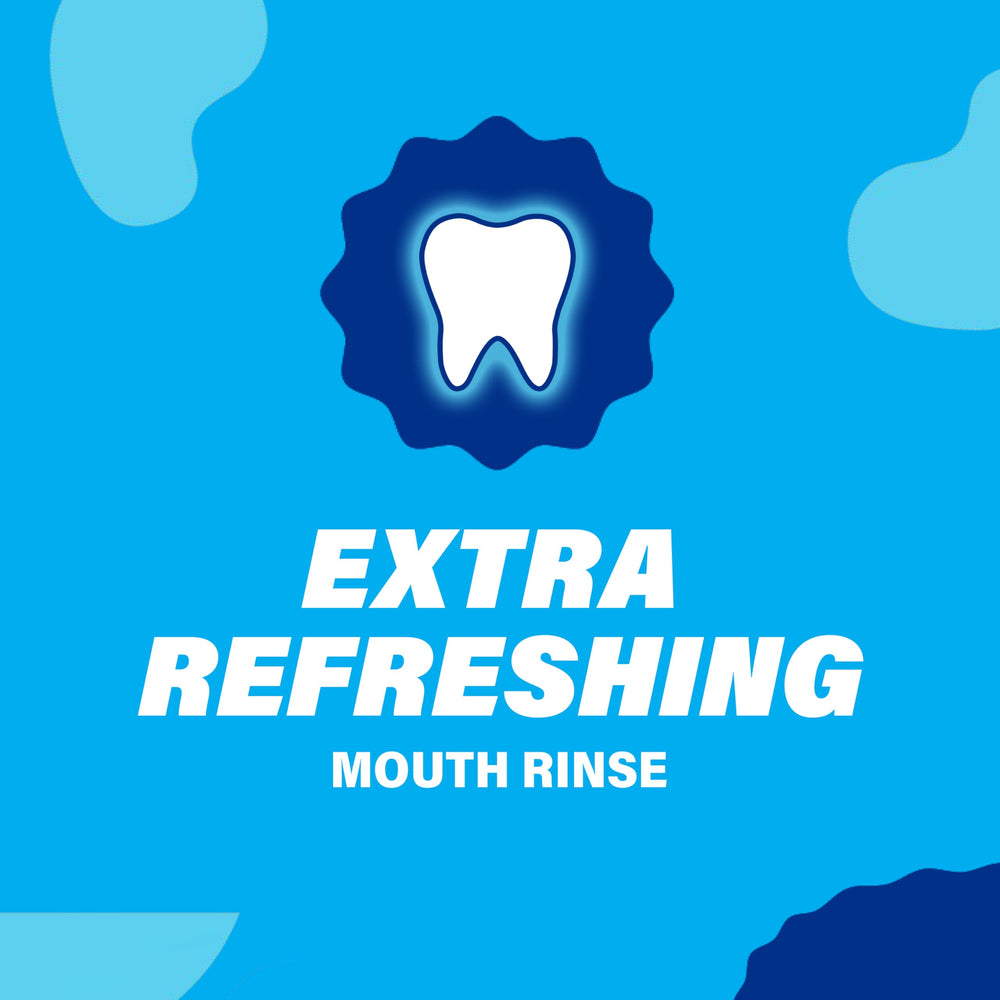Mouthwash on bathroom counter beside toothbrushes