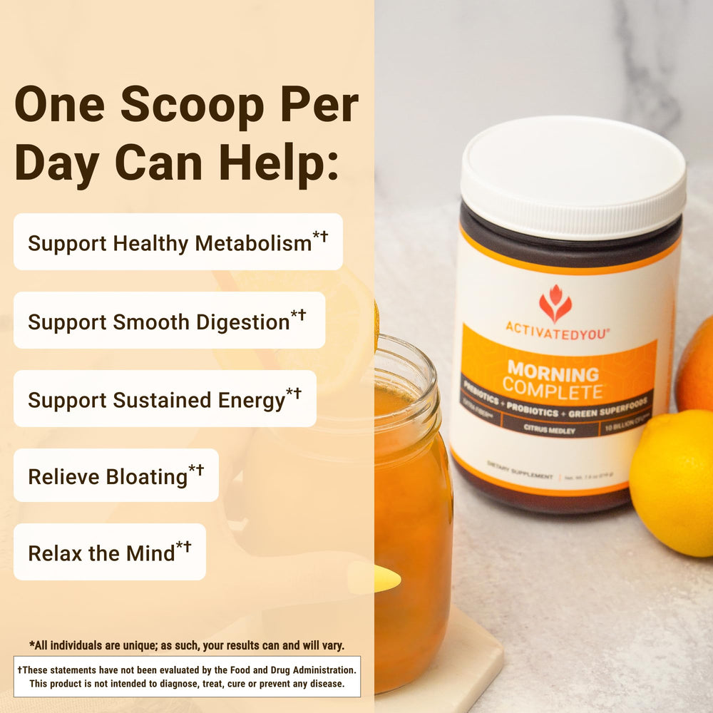 ActivatedYou Morning Complete scoop beside a mug for easy morning routine.