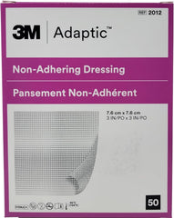 Adaptic non-adherent dressing 3x3 box view protects wounds without sticking.