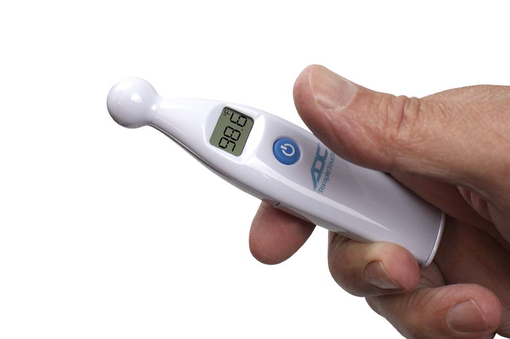 ADC Adtemp 427 temporal-contact thermometer with LCD display in use.