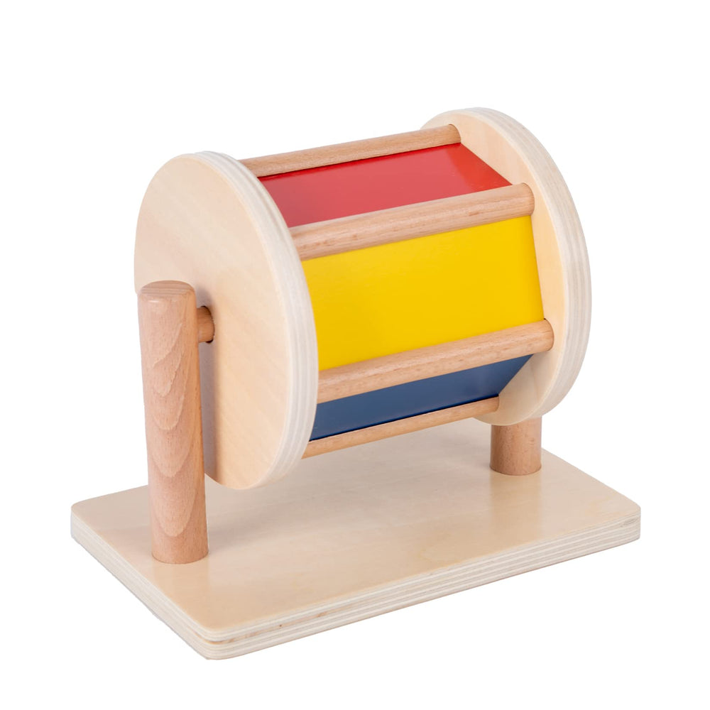 Adena Montessori rolling drum motion strengthens arm and wrist control