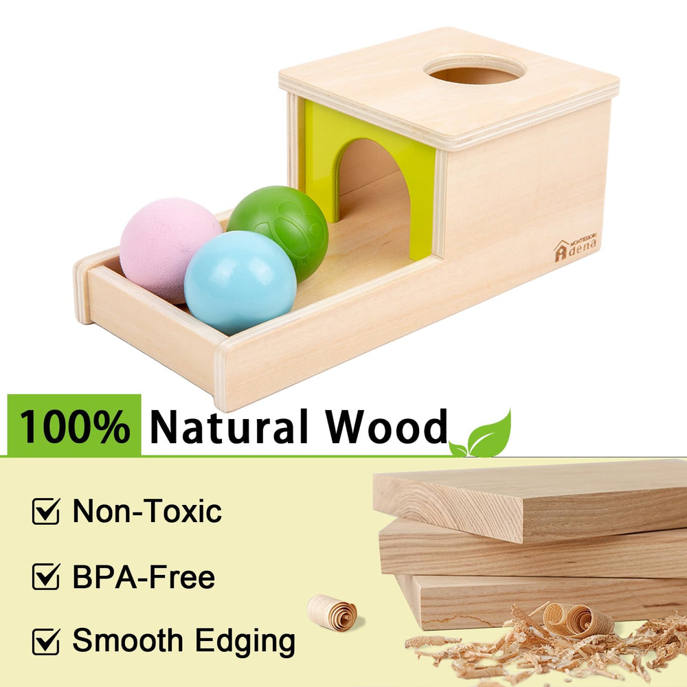 Adena Montessori object permanence box hand insert shot demonstrates fine motor skill practice