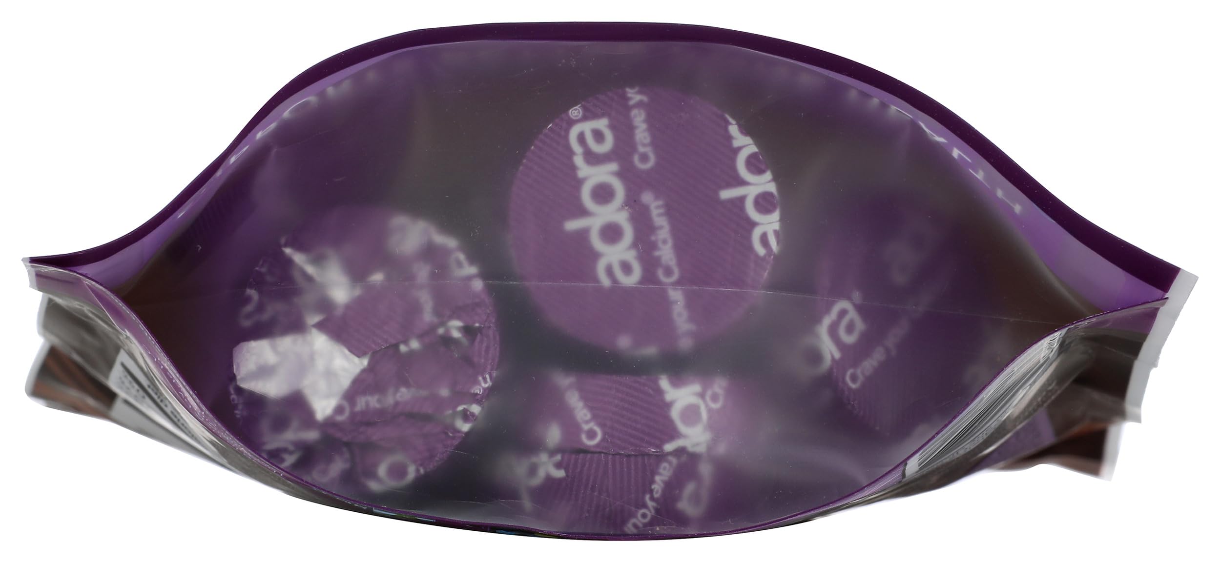 Closeup of Adora calcium disk melt-in-mouth texture and rich chocolate.
