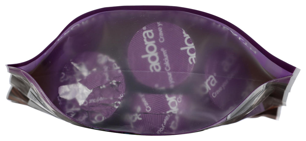 Closeup of Adora calcium disk melt-in-mouth texture and rich chocolate.