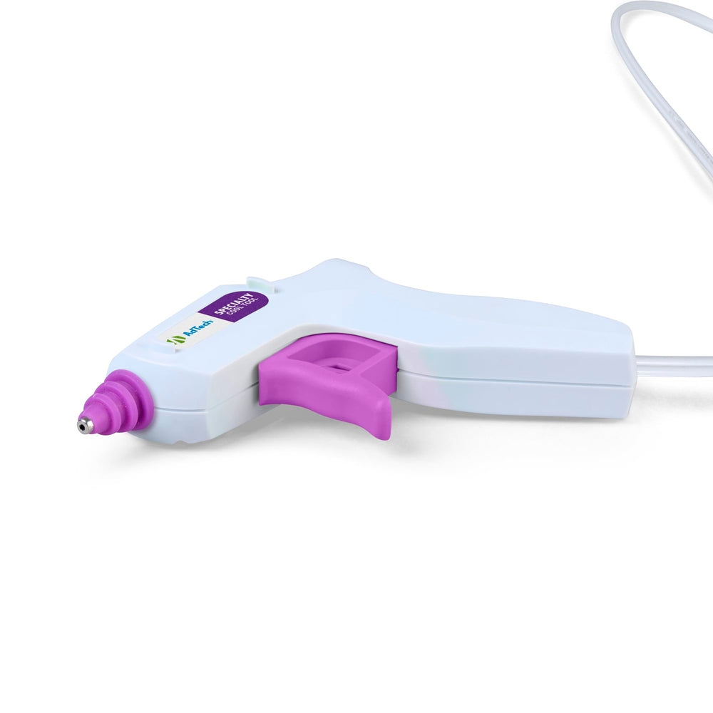 AdTech glue gun designed for delicate fabrics and scrapbooking papers.