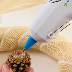 AdTech hot glue sticks compatible with mini glue guns for versatile crafting.