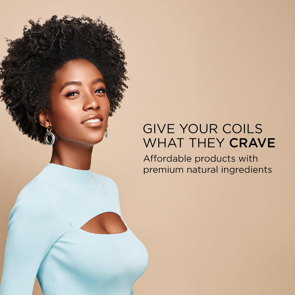 Glide through curls with African Pride Moisture Miracle for smoother detangling.