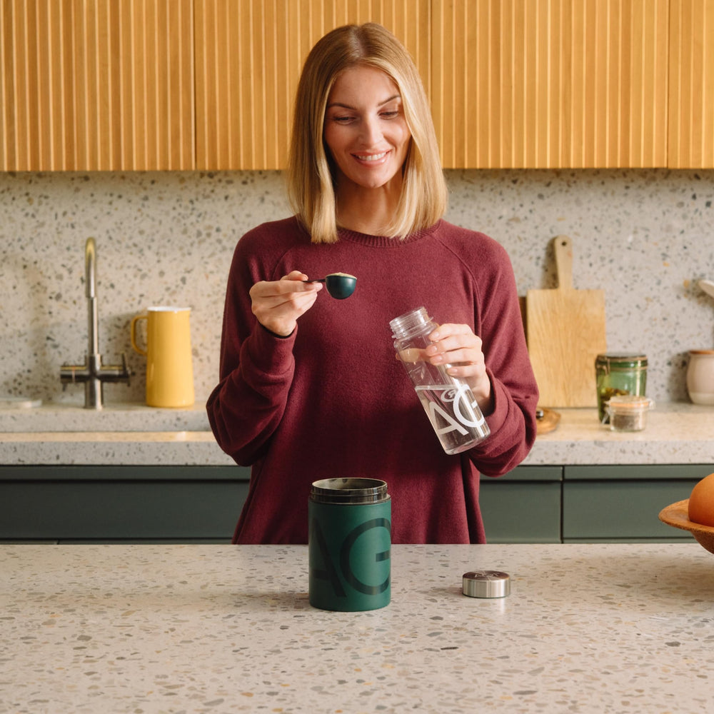 AG1 Omega3 daily-use bottle alongside meals supports routine wellness.