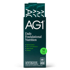 AG1 tub with scoop shows convenient daily nutrition support.