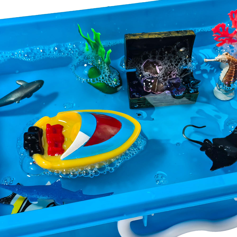 AGENTLAN Ocean Sensory Bin sea grass invites imaginative habitats and role-play ideas.