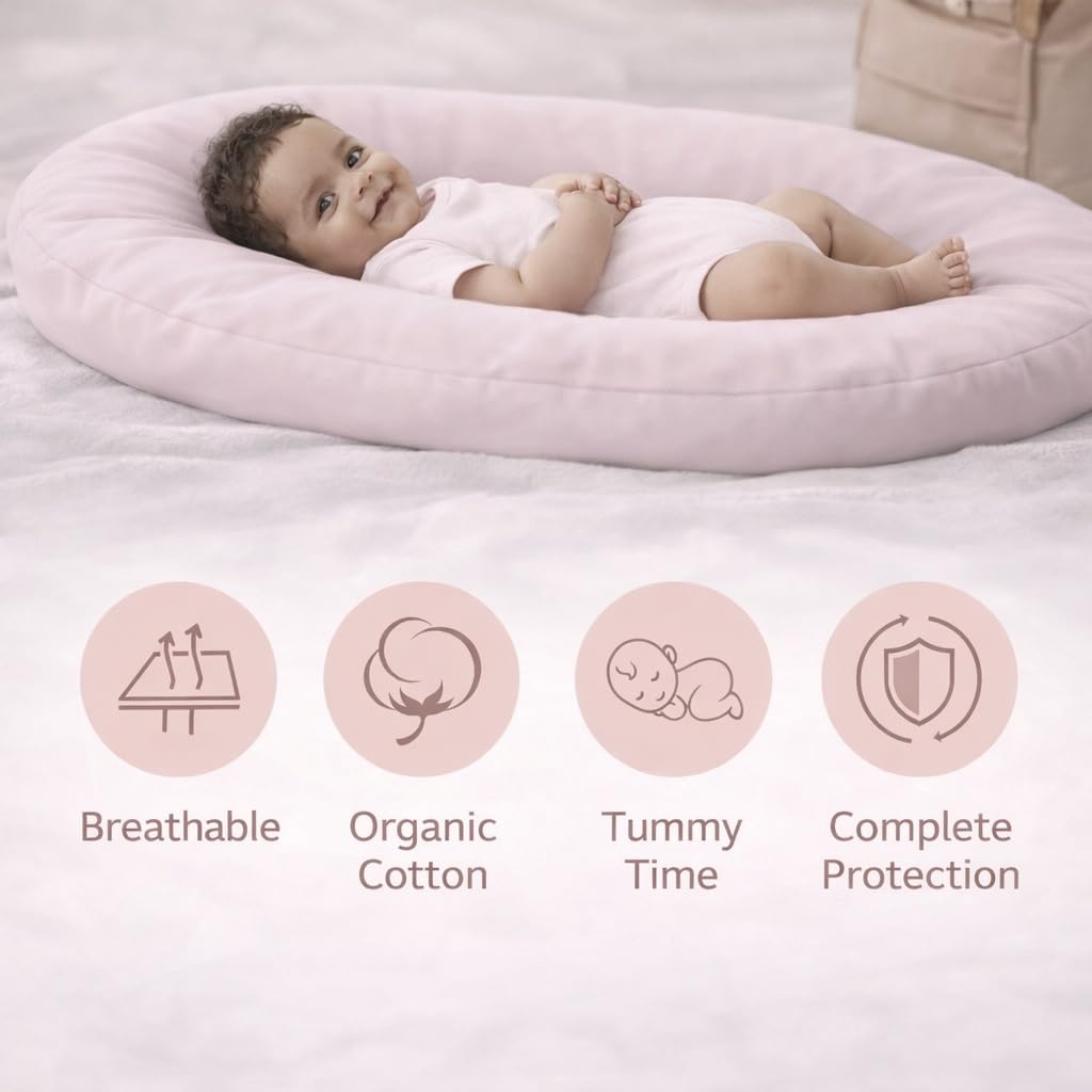 Aila + Aiden baby lounger pink carry handles enable travel.
