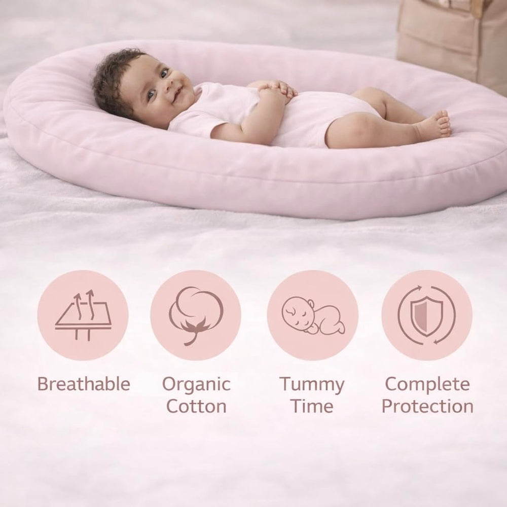 Aila + Aiden baby lounger pink carry handles enable travel.