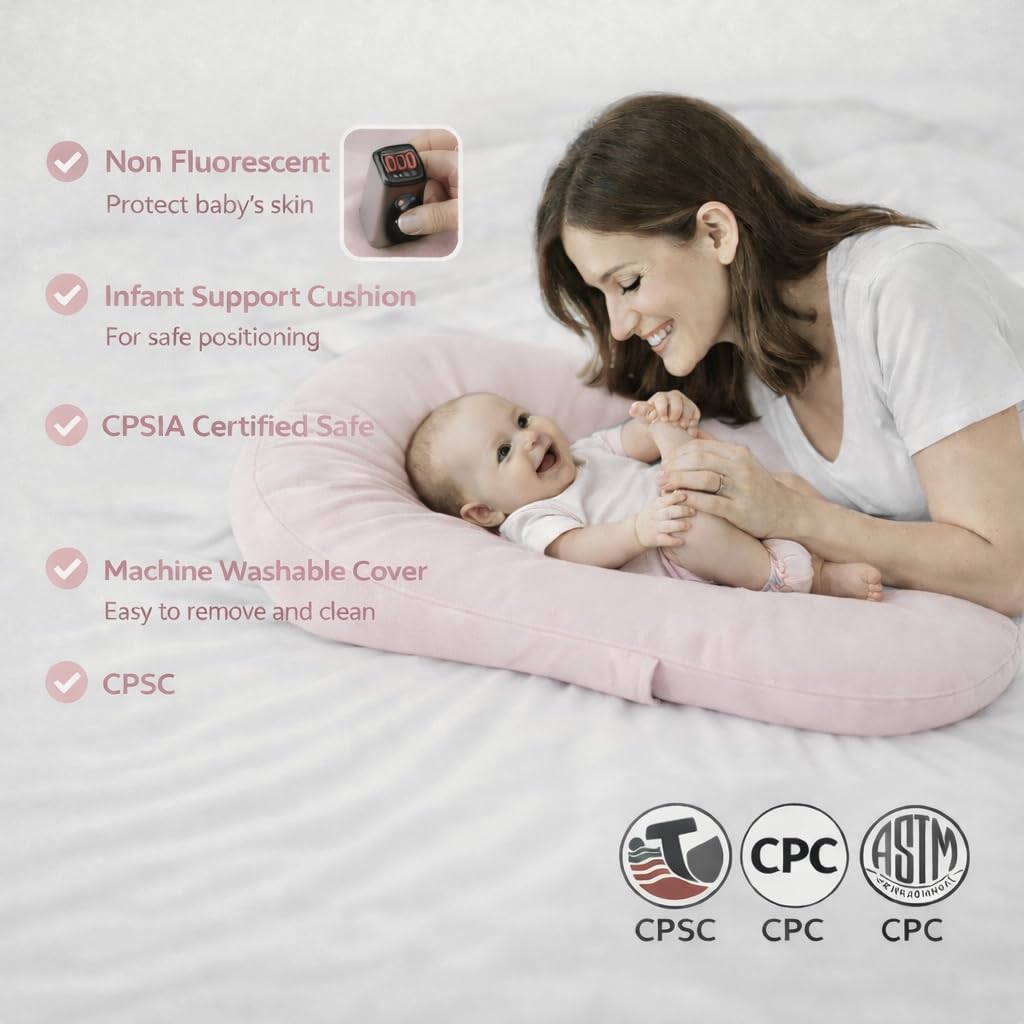 Aila + Aiden baby lounger pink front view shows portable design.