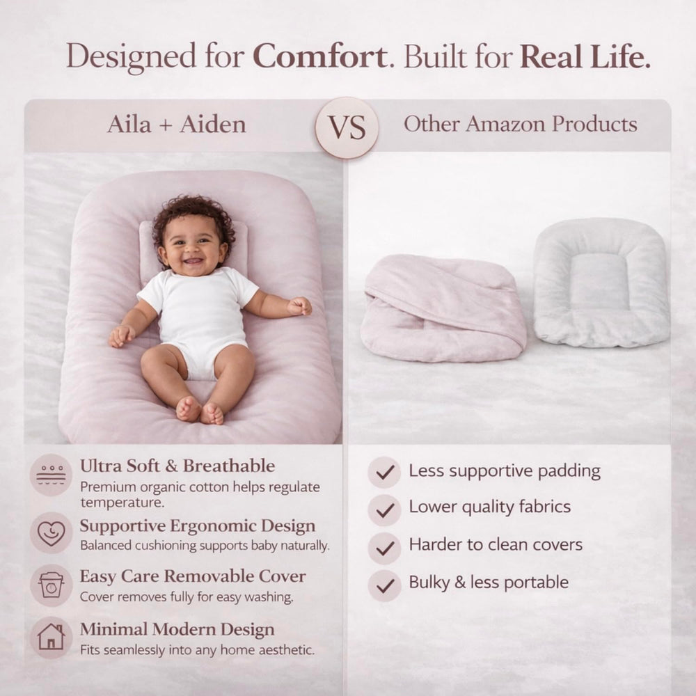 Aila + Aiden baby lounger pink washable cover for quick cleanup.