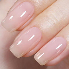 AILLSA milky pink nude gel polish swatch with translucent jelly finish