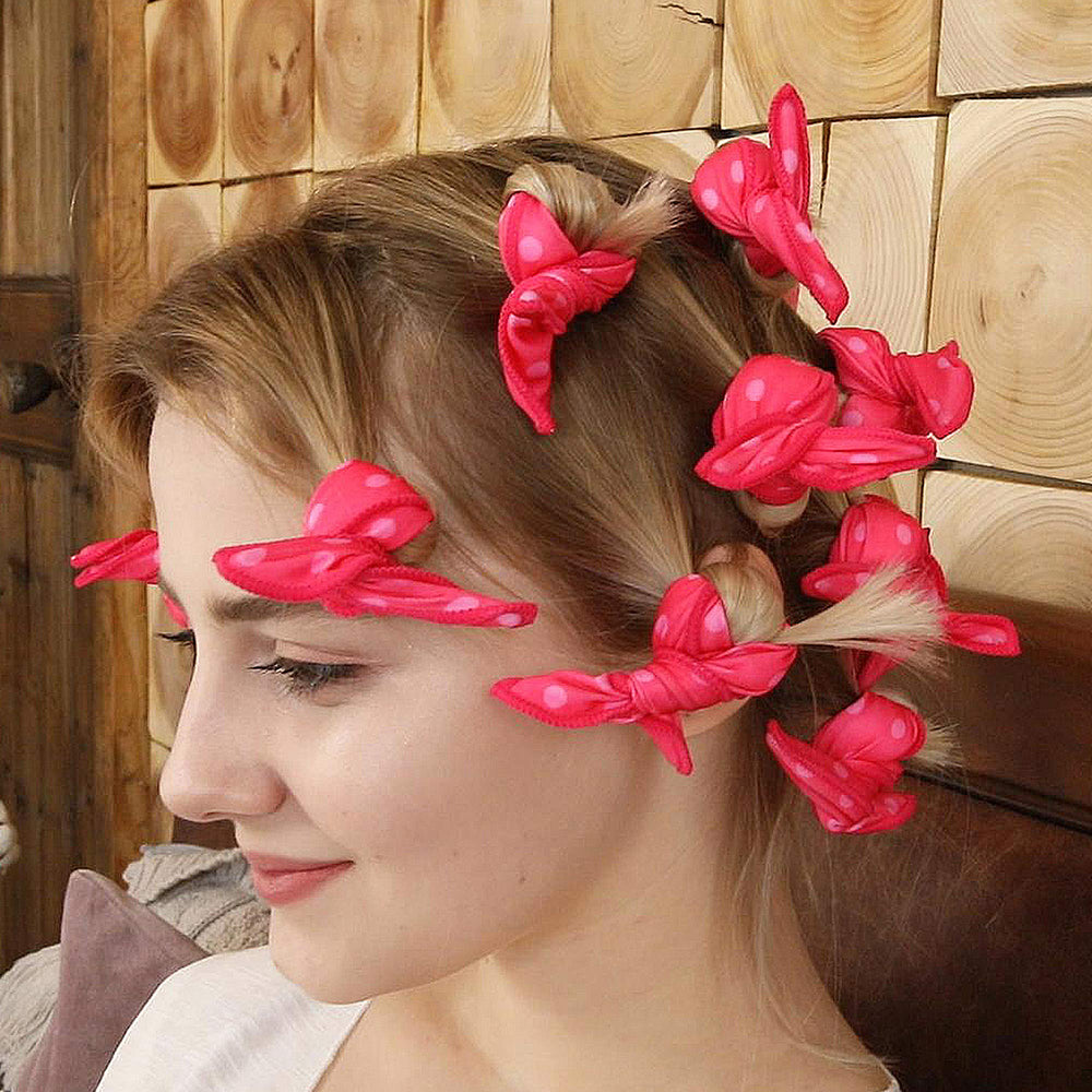 Close-up of Aimin Hair Soft Curlers pink foam rollers, lightweight and travel-friendly