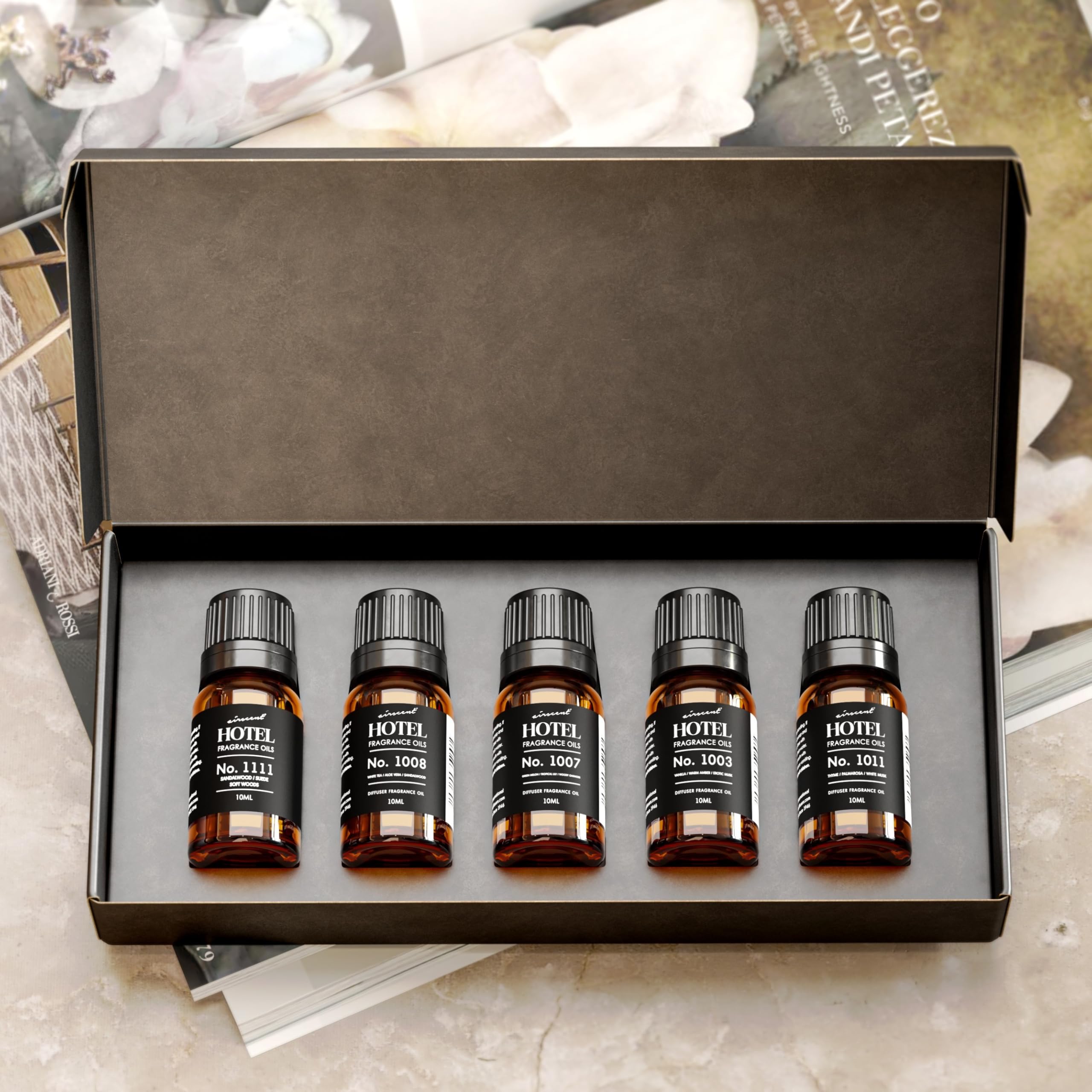 Air-Scent lobby-mist bottle closeup for refined, consistent fragrance in any room.