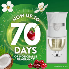 Air Wick Paradise Retreat oil dispense action showing scent release