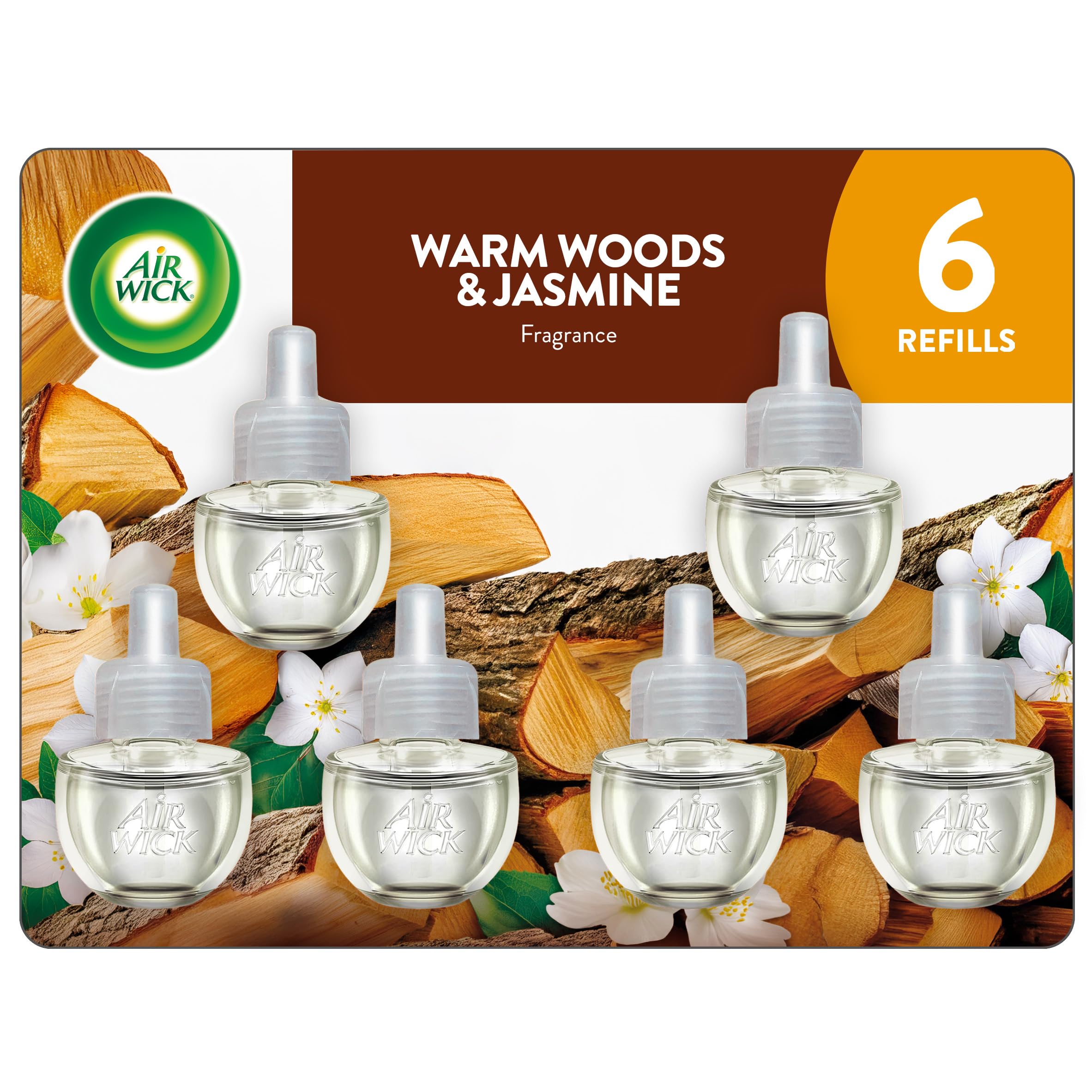 Air Wick plug-in scented oil refill Warm Woods Jasmine bottle ready for continuous fragrance.