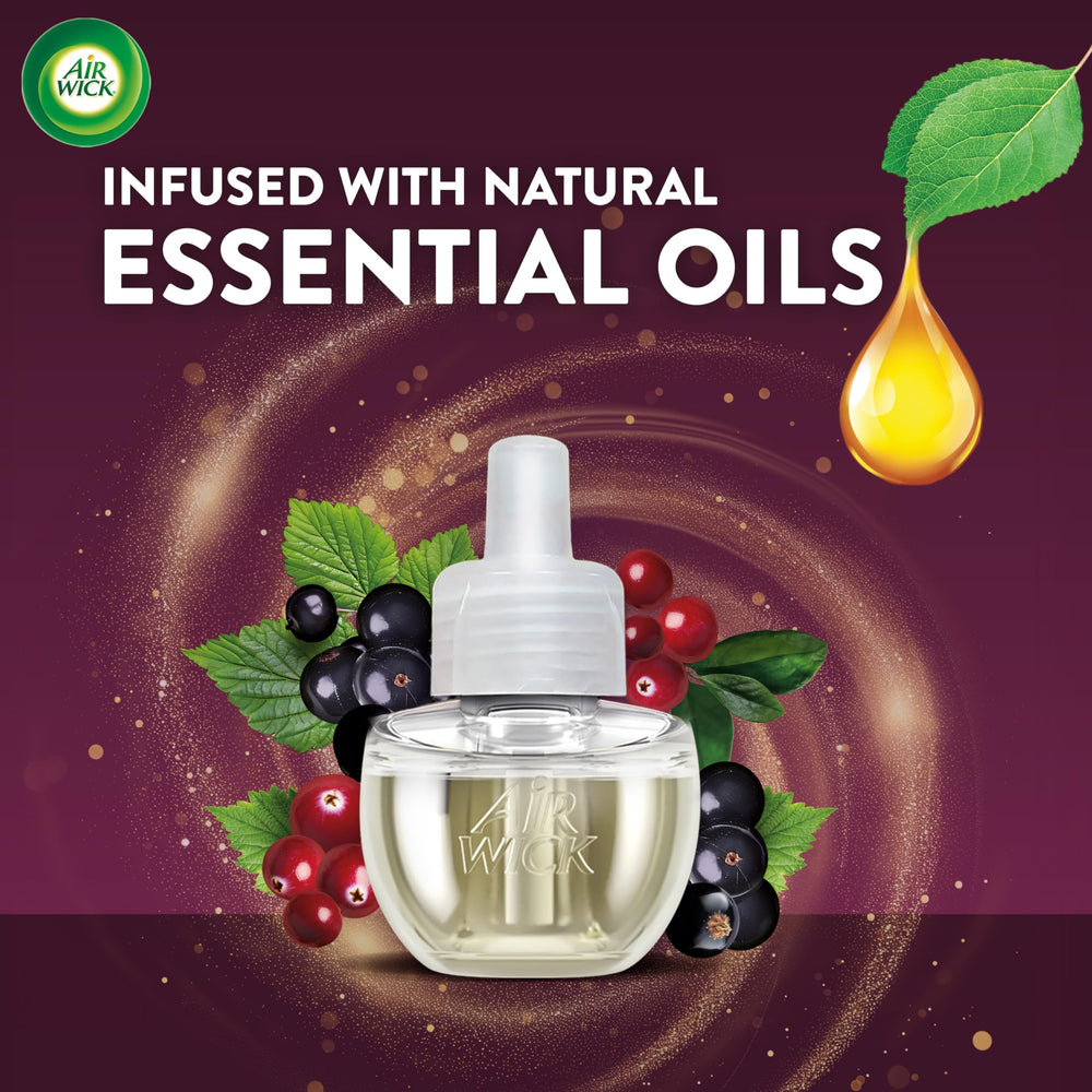 Air Wick refill bottle close-up highlighting essential oils for a richer scent.