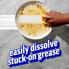 Ajax Ultra Liquid Dish Soap bottle pouring vinegar power to tackle tough stains.