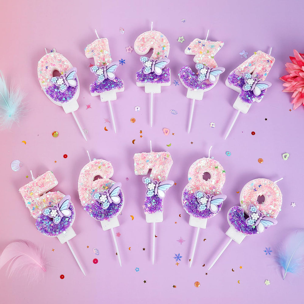 AKURIEEY butterfly candles on cake emitting a delicate glow