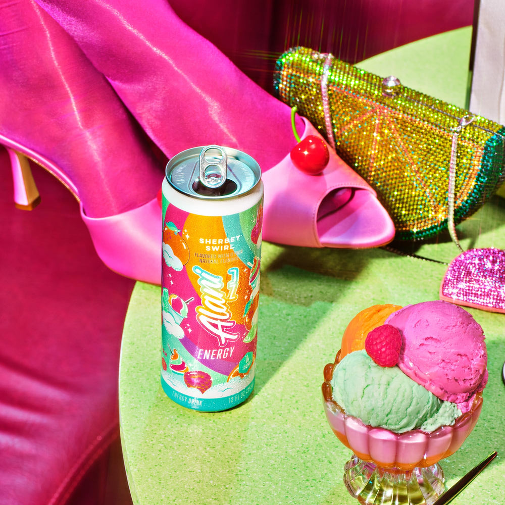 Alani Nu Sherbet Swirls glass with ice conveys refreshing energy in action