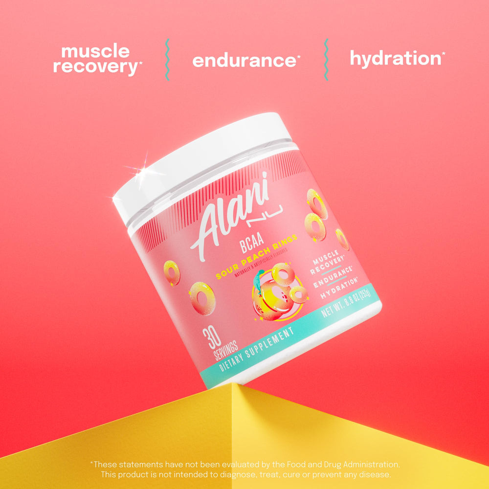 Alani Nu BCAA Sour Peach Ring glass with fizz ready to drink.
