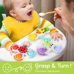 Young child spins the ALASOU spinner with focused attention