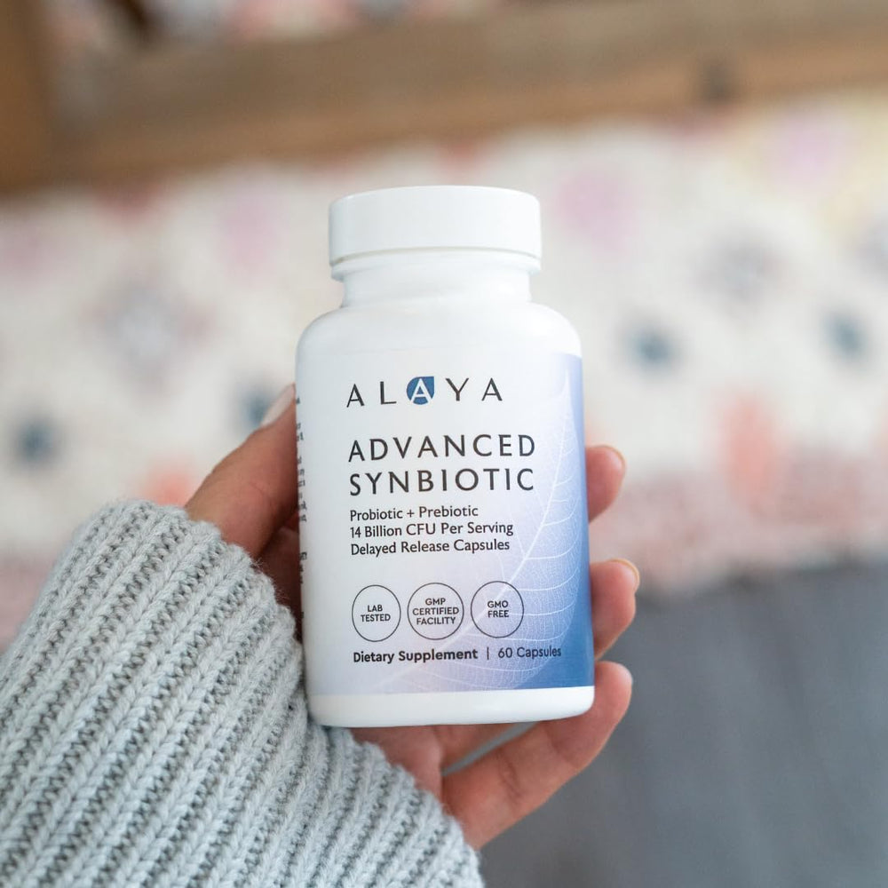 Capsules beside the bottle illustrating simple daily dosing for Alaya Naturals.