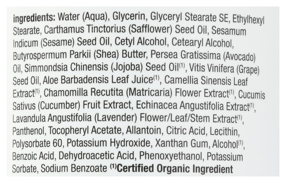 Alba Botanica Lotion Emollient Unscented bathroom setting suggests daily skincare routine.