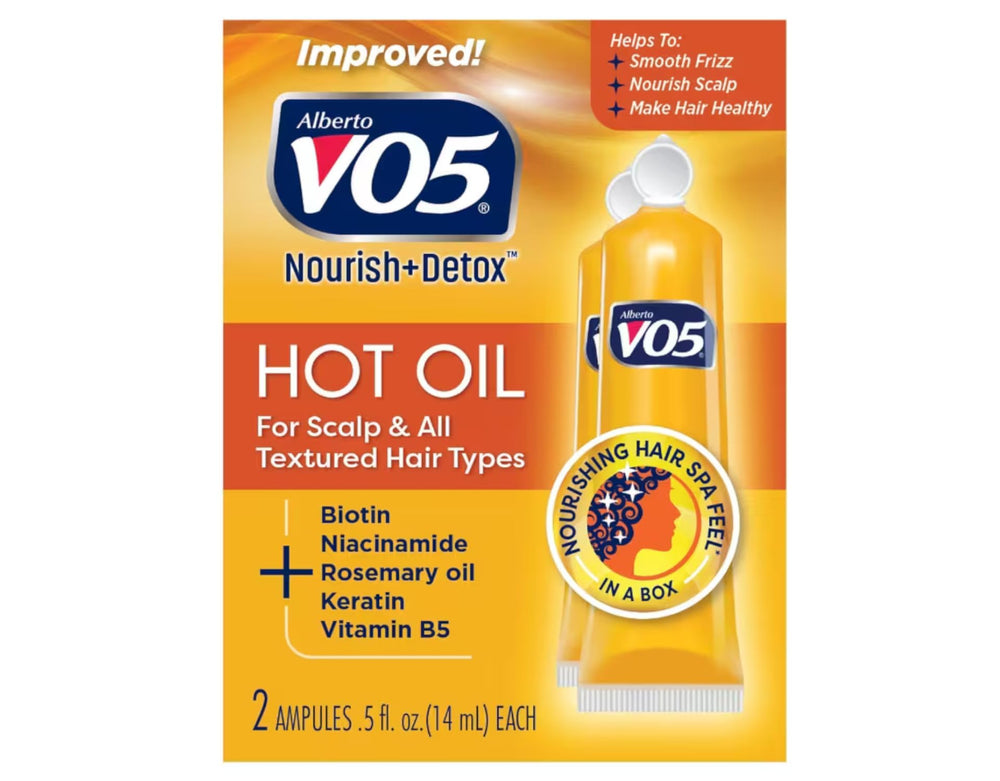 Alberto VO5 Hot Oil Therapy bottle ready to restore moisture in hair.