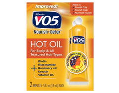 Alberto VO5 Hot Oil Therapy bottle ready to restore moisture in hair.