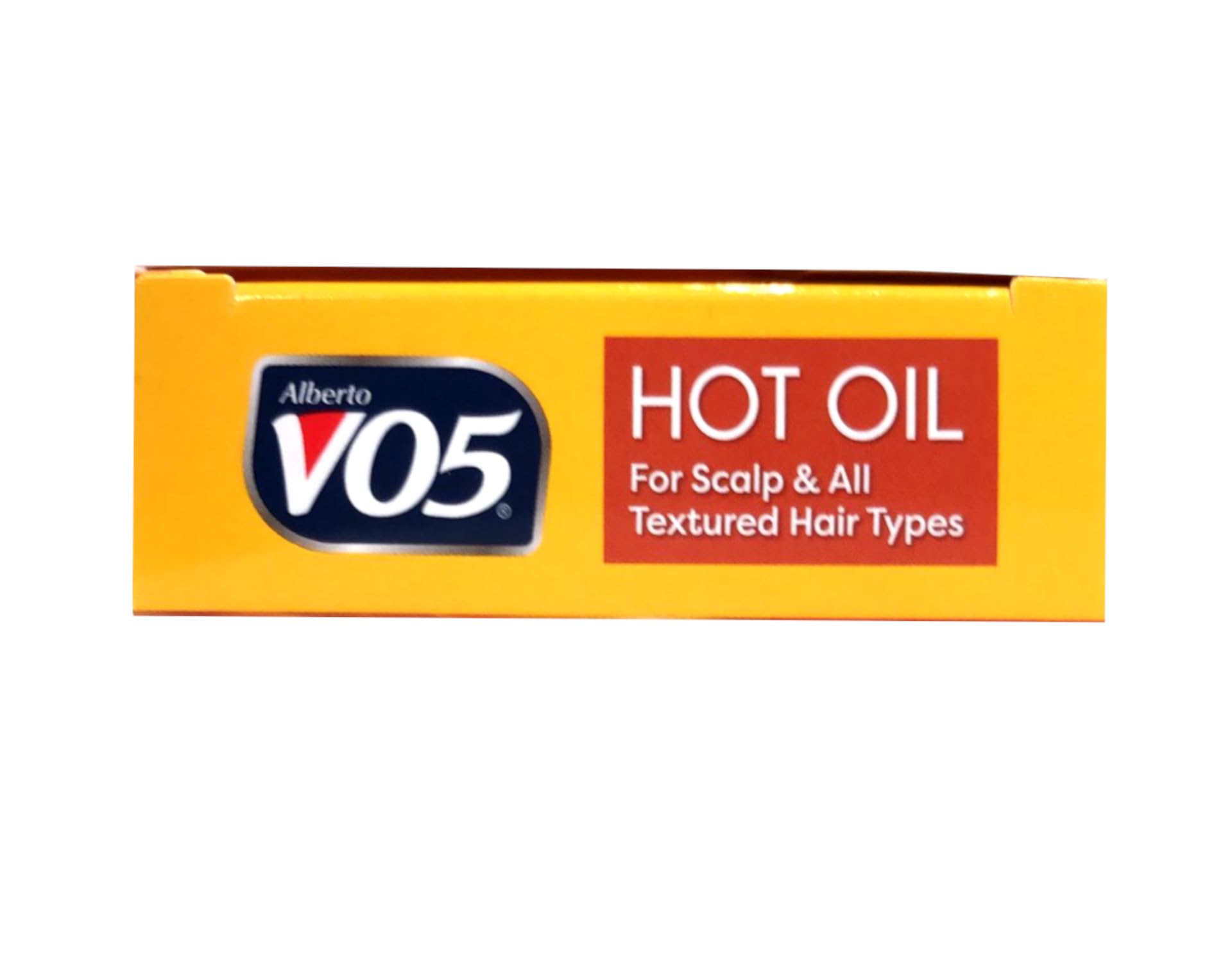 Hair after VO5 Hot Oil Therapy shows shine and softness.